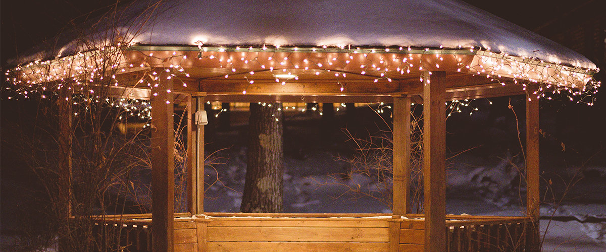 Christmas lights on gazebo in winter